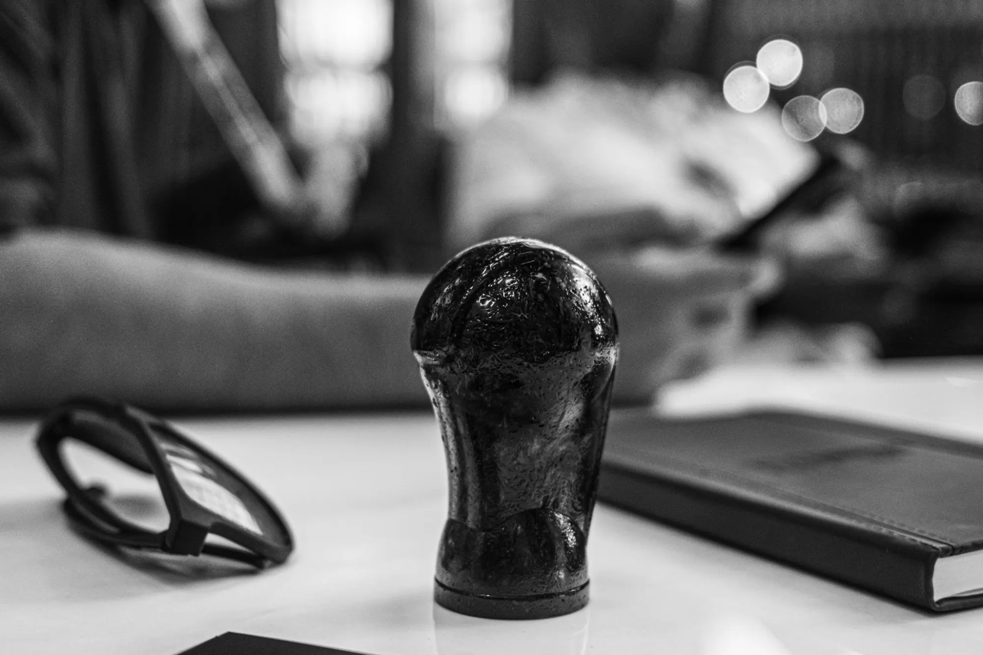 Molded DARC shift knob standing on a desk