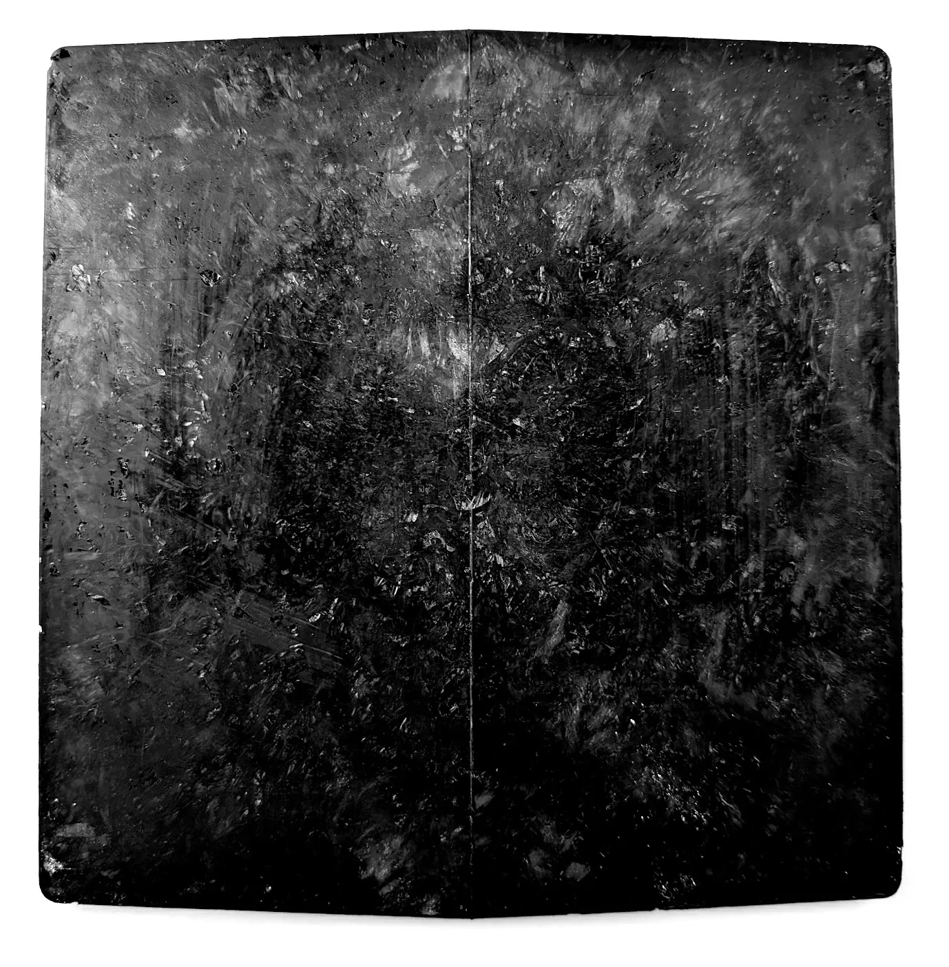 Early development sample of a molded DARC panel, showing randomly oriented carbon fiber chips